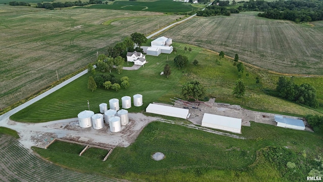 1626 210th St, Reynolds, IL 61279 - aerial overview of property's location featuring rural landscape and rows of crops