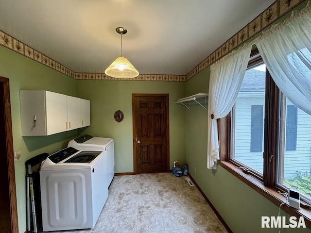 1626 210th St, Reynolds, IL 61279 - laundry room with cabinet space and washing machine and dryer