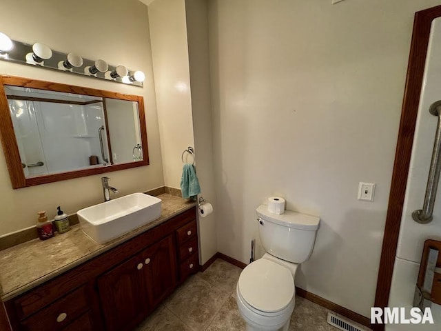 1626 210th St, Reynolds, IL 61279 - bathroom with vanity and tile patterned flooring