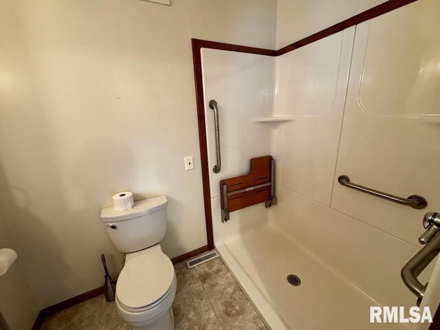 1626 210th St, Reynolds, IL 61279 - bathroom featuring toilet and a shower