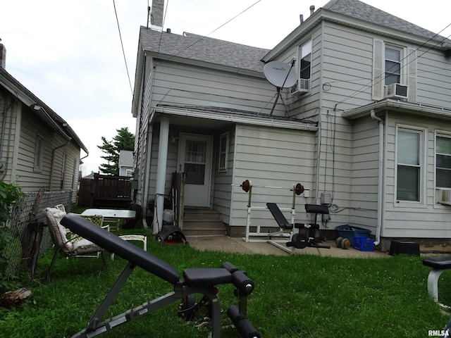 608-610 26th St, Rock Island, IL 61201 - rear view of house with entry steps, roof with shingles, and cooling unit