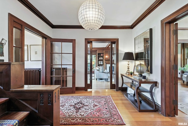 118 Ridgewood Ave, Davenport, IA 52803 - entrance foyer featuring light wood-style floors and crown molding