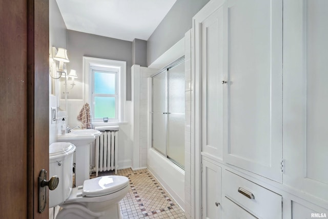 118 Ridgewood Ave, Davenport, IA 52803 - full bath with radiator, shower / bath combination with glass door, and tile patterned flooring
