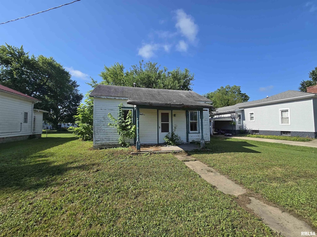 309 E Main St, Clayton, IL 62324 - view of front of house featuring a front yard and covered porch