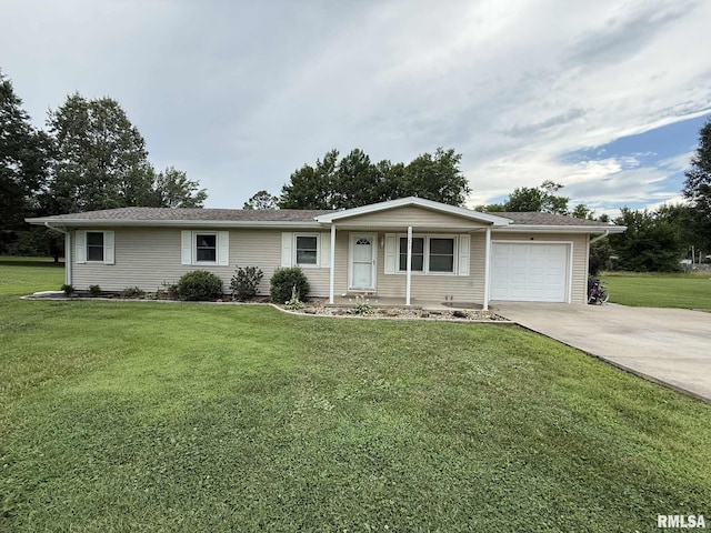 15293 Wall St, Carterville, IL 62918 - ranch-style home with an attached garage, concrete driveway, and a front lawn