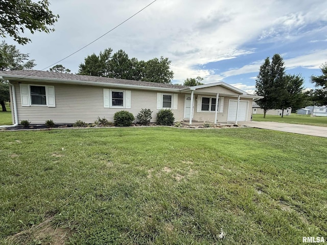 15293 Wall St, Carterville, IL 62918 - single story home with an attached garage, driveway, and a front yard