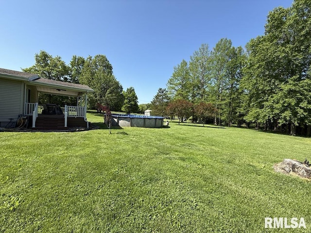 15293 Wall St, Carterville, IL 62918 - view of grassy yard featuring a covered pool