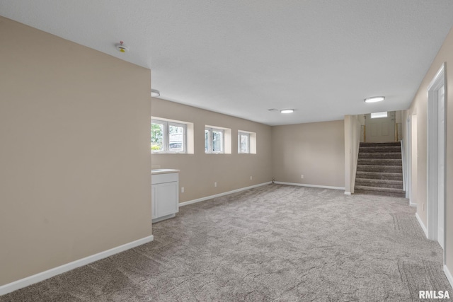 5210 N Division St, Davenport, IA 52806 - basement with carpet and stairway