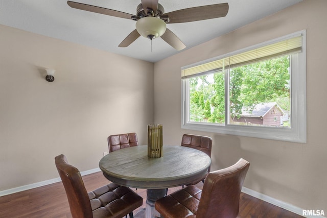5210 N Division St, Davenport, IA 52806 - dining room with dark wood-style flooring and ceiling fan