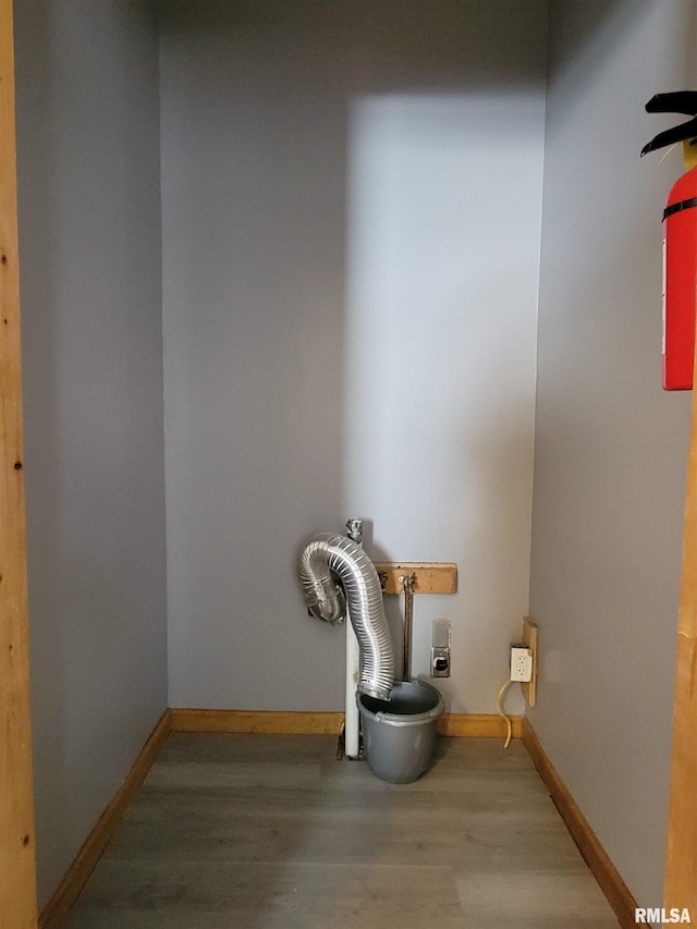 819 12th Ave S, Clinton, IA 52732 - detailed view of wood finished floors and baseboards