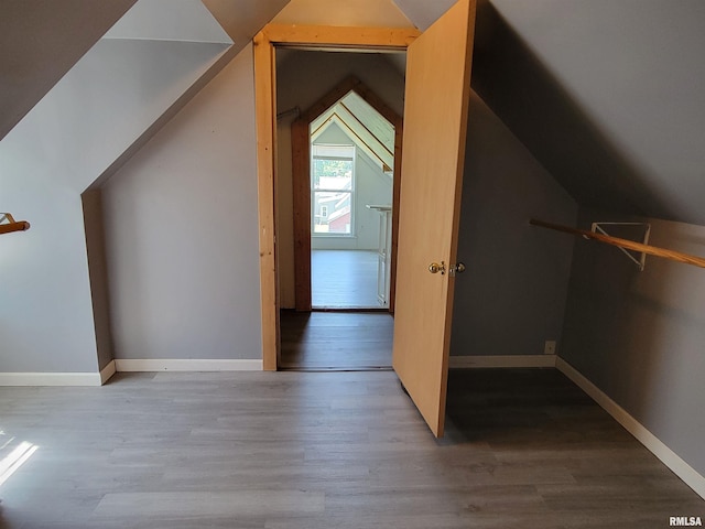 819 12th Ave S, Clinton, IA 52732 - additional living space featuring lofted ceiling and wood finished floors