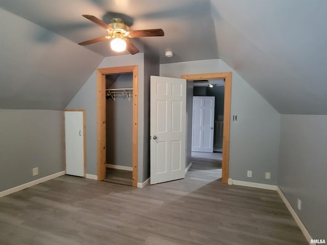819 12th Ave S, Clinton, IA 52732 - bonus room with ceiling fan, lofted ceiling, and wood finished floors