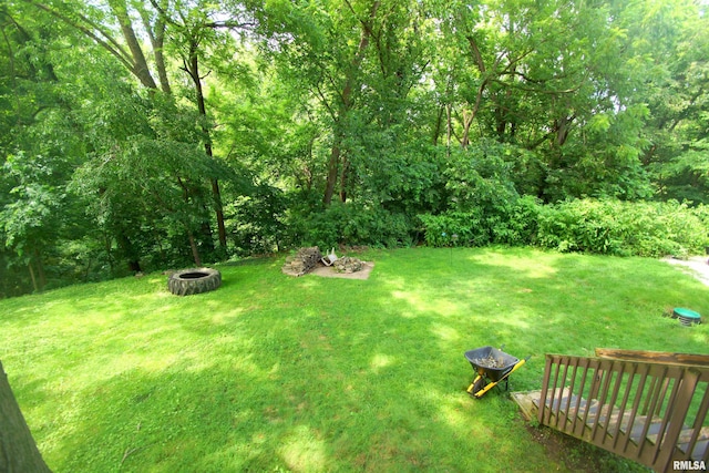 3422 Hobson Ave, Davenport, IA 52802 - view of green lawn with an outdoor fire pit