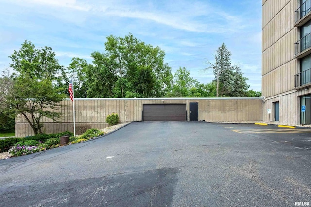 1800 7th St Unit 10E, East Moline, IL 61244 - garage featuring uncovered parking