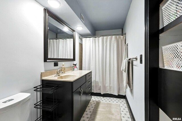 1800 7th St Unit 10E, East Moline, IL 61244 - full bathroom with vanity and toilet