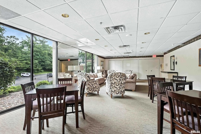 1800 7th St Unit 10E, East Moline, IL 61244 - dining room featuring carpet and expansive windows