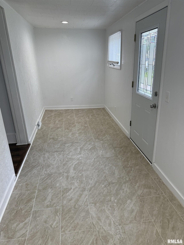 235 20th Pl, Clinton, IA 52732 - spare room with baseboards