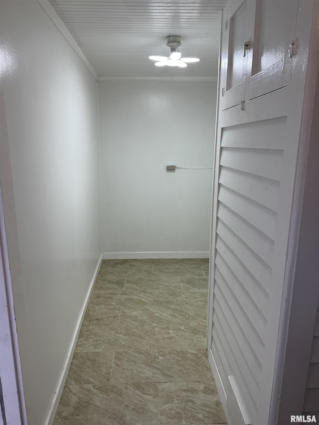 235 20th Pl, Clinton, IA 52732 - spare room featuring baseboards and crown molding
