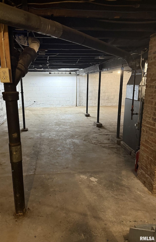 235 20th Pl, Clinton, IA 52732 - unfinished basement with brick wall