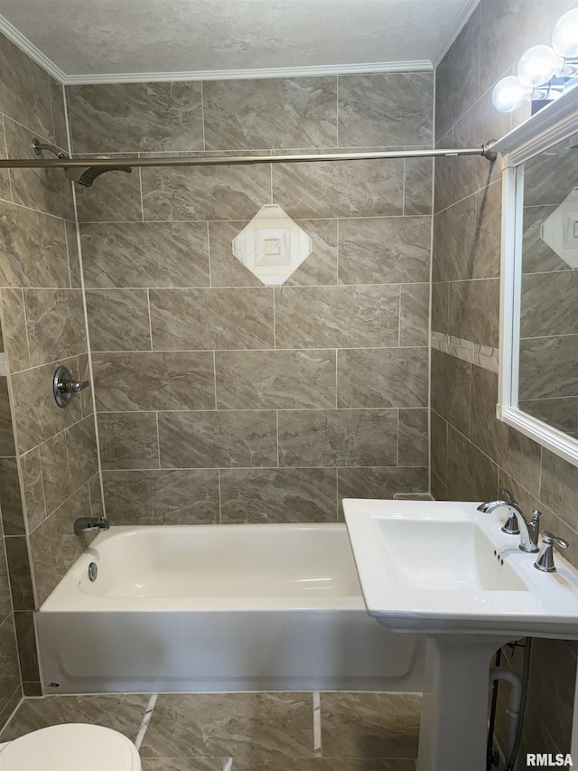 235 20th Pl, Clinton, IA 52732 - full bathroom featuring crown molding, washtub / shower combination, and tile walls