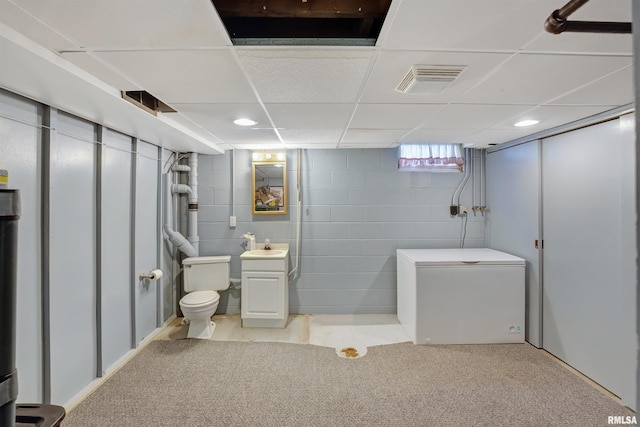 1217 7th St, De Witt, IA 52742 - bathroom featuring toilet and vanity