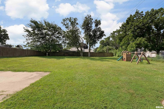 1217 7th St, De Witt, IA 52742 - view of yard with a playground
