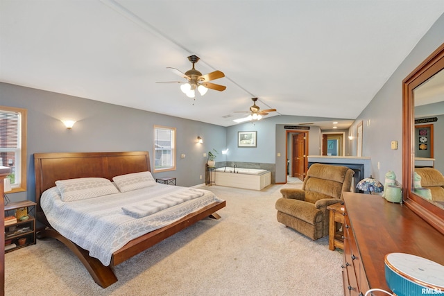 1217 7th St, De Witt, IA 52742 - bedroom featuring lofted ceiling, carpet flooring, and a ceiling fan