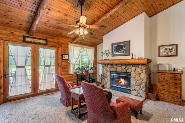 4830 Wyoming Ave, Davenport, IA 52806 - living room featuring wood ceiling, carpet, a stone fireplace, and ceiling fan