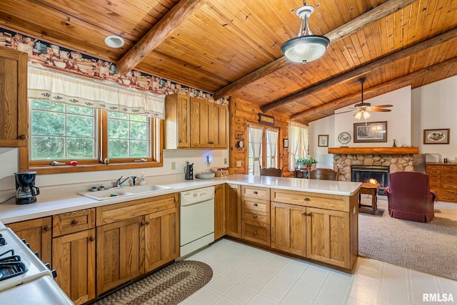 4830 Wyoming Ave, Davenport, IA 52806 - kitchen featuring white dishwasher, wooden ceiling, a peninsula, a fireplace, and light countertops