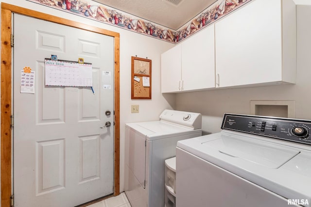 4830 Wyoming Ave, Davenport, IA 52806 - laundry area with independent washer and dryer and cabinet space