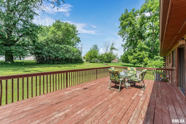 4830 Wyoming Ave, Davenport, IA 52806 - wooden deck with a lawn and outdoor dining area