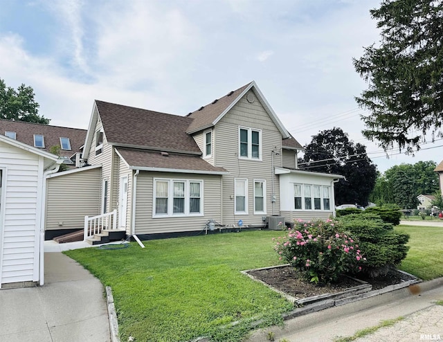 616 Elk St, Sabula, IA 52070 - view of front of property with roof with shingles and a front lawn