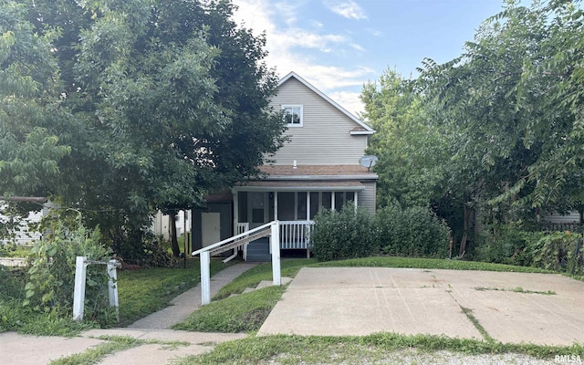 616 1st Ave, Silvis, IL 61282 - obstructed view of property with covered porch