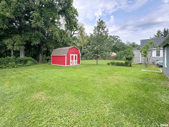 3327 2nd St, East Moline, IL 61244 - view of grassy yard featuring a storage unit