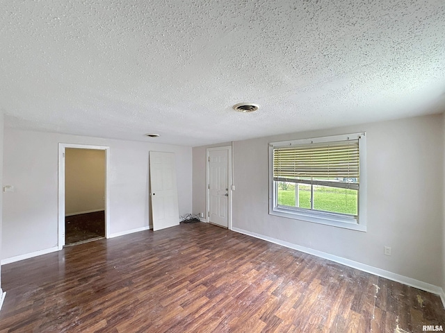 3327 2nd St, East Moline, IL 61244 - unfurnished room with wood finished floors and a textured ceiling