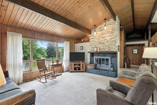 28002 230th St, Le Claire, IA 52753 - living room featuring wood walls, carpet, wooden ceiling, and a fireplace