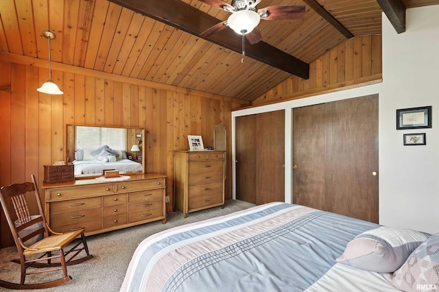 28002 230th St, Le Claire, IA 52753 - bedroom featuring light carpet, wood ceiling, wood walls, and two closets