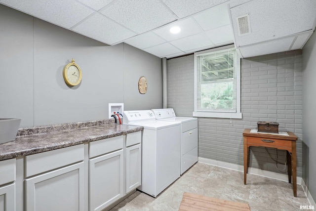 28002 230th St, Le Claire, IA 52753 - washroom featuring washer and dryer and cabinet space