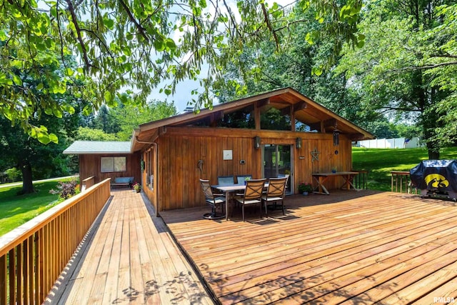 28002 230th St, Le Claire, IA 52753 - wooden deck featuring a yard, outdoor dining space, and grilling area