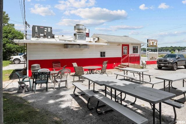 1204 N Cody Rd, Le Claire, IA 52753 - view of patio featuring outdoor dining space