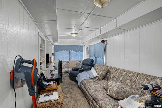1204 N Cody Rd, Le Claire, IA 52753 - carpeted living area with wooden walls