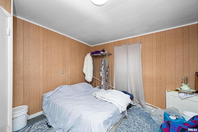 1204 N Cody Rd, Le Claire, IA 52753 - bedroom featuring wooden walls