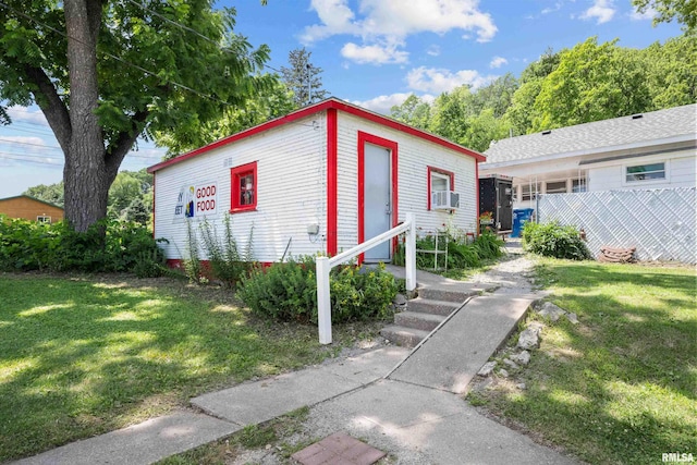 1204 N Cody Rd, Le Claire, IA 52753 - view of front facade with cooling unit