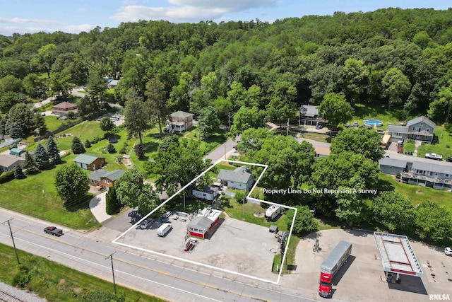 1204 N Cody Rd, Le Claire, IA 52753 - view of property location featuring property parcel outlined and a forest