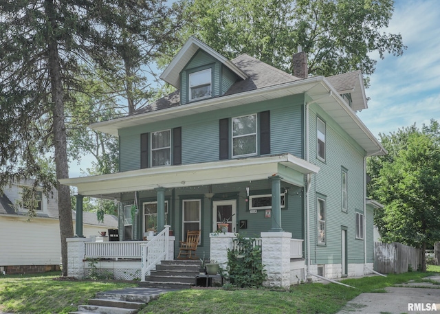 1610 12th Ave, Rock Island, IL 61201 - traditional style home featuring covered porch and a chimney