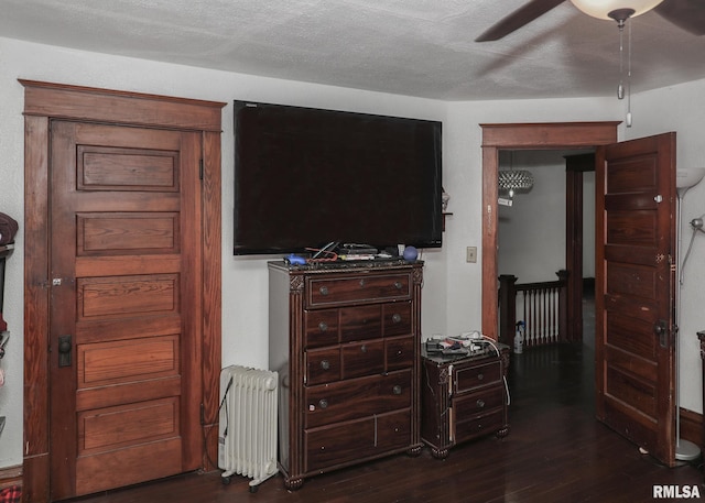 1610 12th Ave, Rock Island, IL 61201 - bedroom featuring radiator, dark wood finished floors, and ceiling fan
