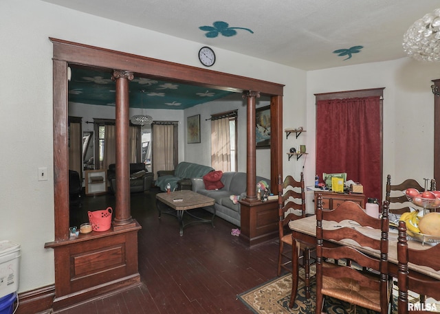1610 12th Ave, Rock Island, IL 61201 - living room featuring wood-type flooring and ornate columns