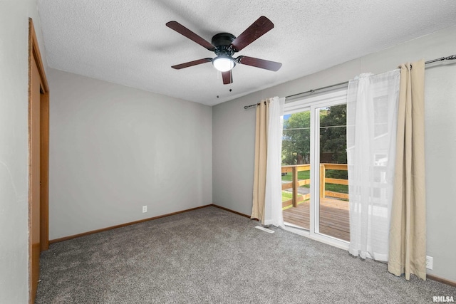 101 W Sheridan Dr, Eldridge, IA 52748 - carpeted spare room featuring a textured ceiling and ceiling fan