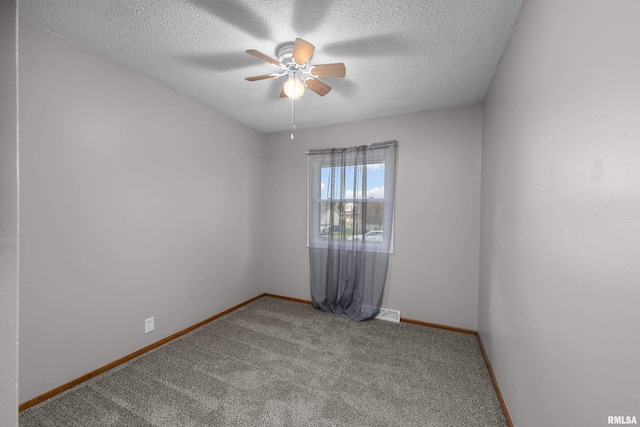 101 W Sheridan Dr, Eldridge, IA 52748 - unfurnished room with carpet floors, a ceiling fan, and a textured ceiling