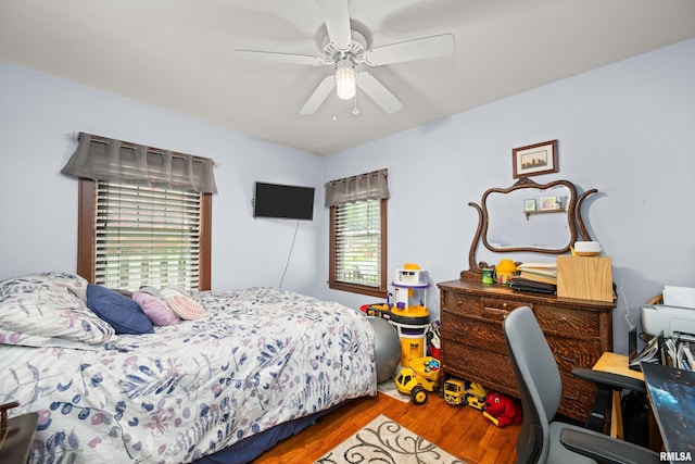 3110 Jefferson Ave, Davenport, IA 52803 - bedroom featuring wood finished floors and ceiling fan